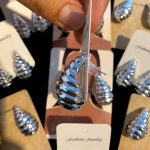 گوشواره دفرمه صدف نقره ای